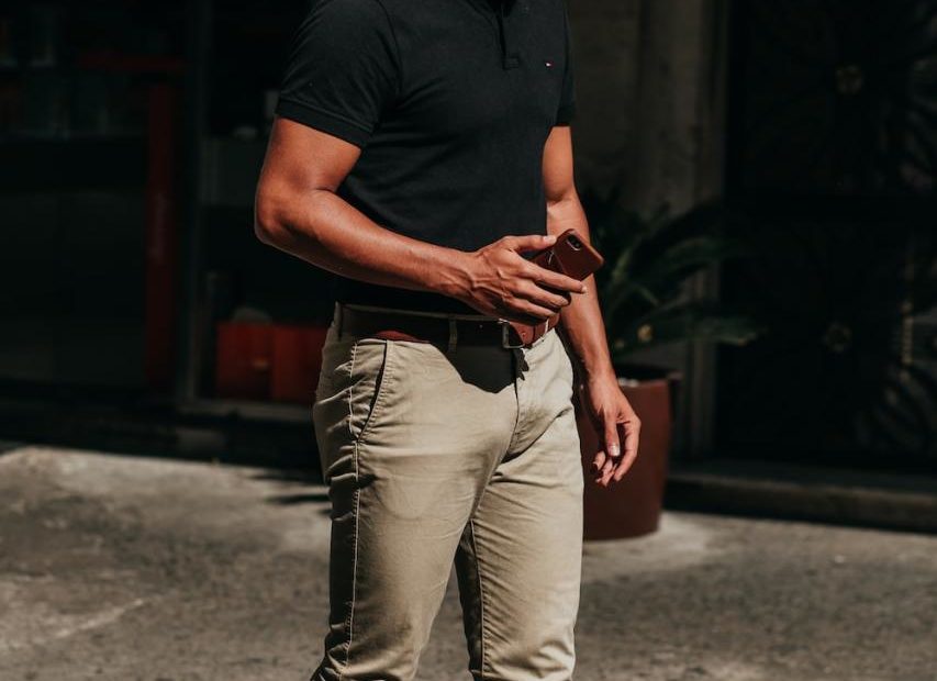 Man In Black Polo Shirt And Blue Denim Jeans Standing On Sidewalk During  Daytime Photo – Free Rio De Janeiro Image On Unsplash