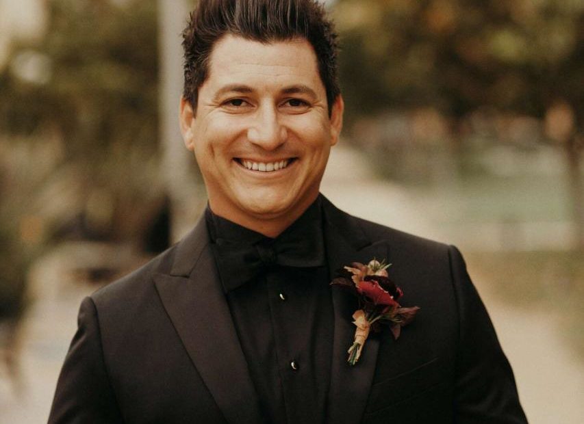 Groom In Black Suit With Black Shirt And Black Tie