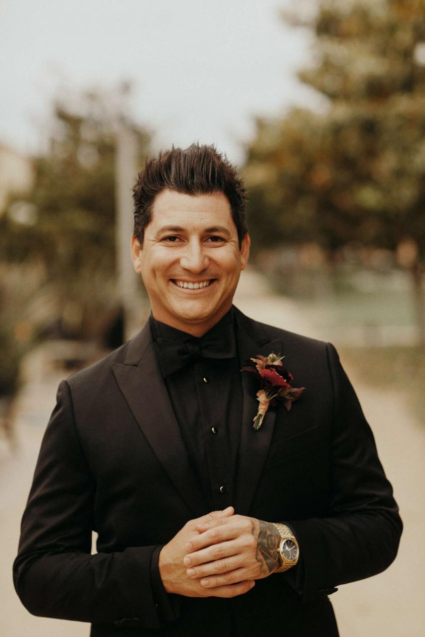 Groom In Black Suit With Black Shirt And Black Tie